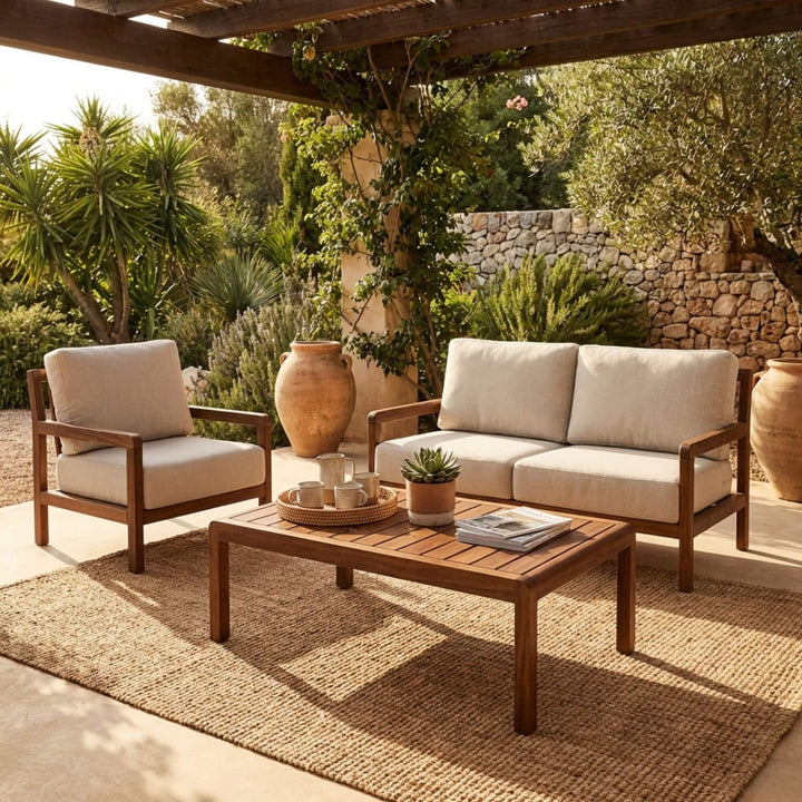 Styled outdoor setting featuring the Tropika coffee table paired with outdoor seating on a terrace.