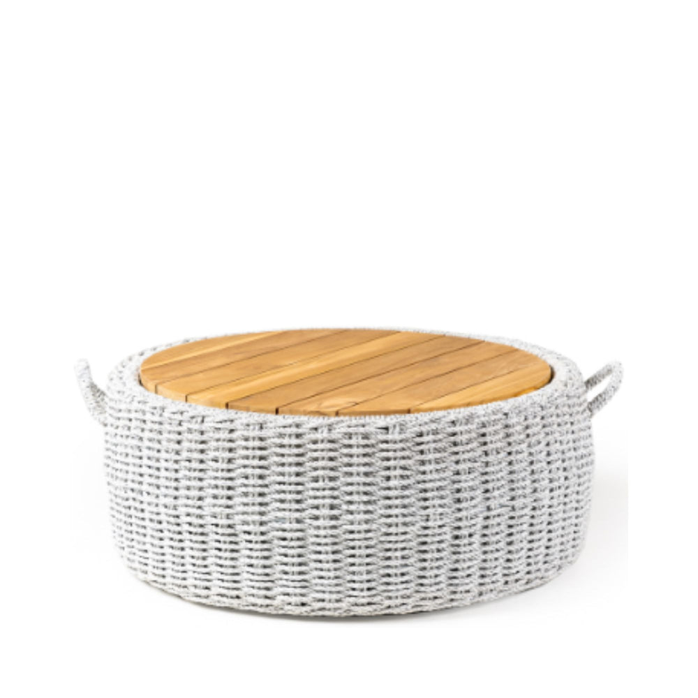 Front view of the Abuk Outdoor Coffee Table showing the round teak wood top and woven polyrattan base.