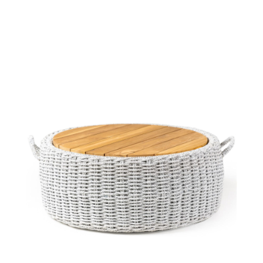 Front view of the Abuk Outdoor Coffee Table showing the round teak wood top and woven polyrattan base.