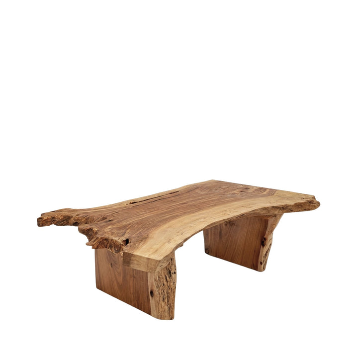 Front view of the Acacia coffee table showcasing its solid wood top and organic edges.