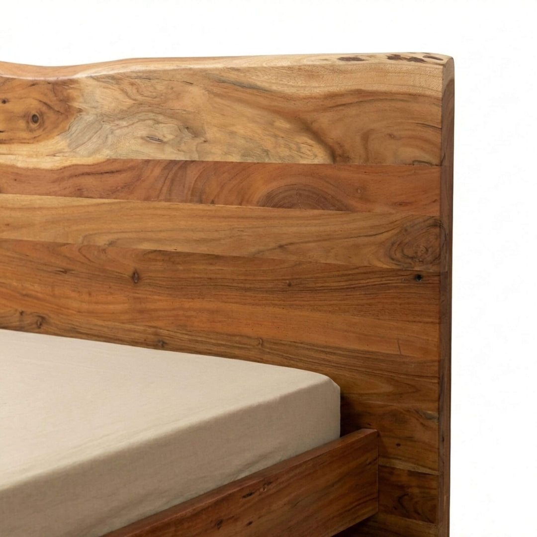 Close-up of the acacia wood bed frame highlighting natural grain, knots, and live-edge detail.