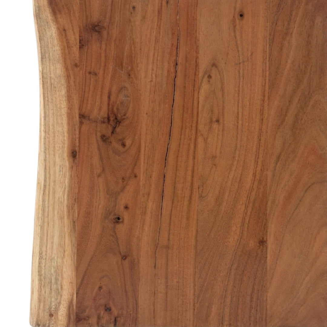 Close-up detail of the acacia wood grain and natural edge finish.