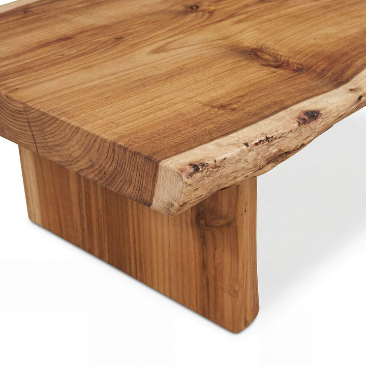 Close-up of the acacia wood grain and natural edge detail.