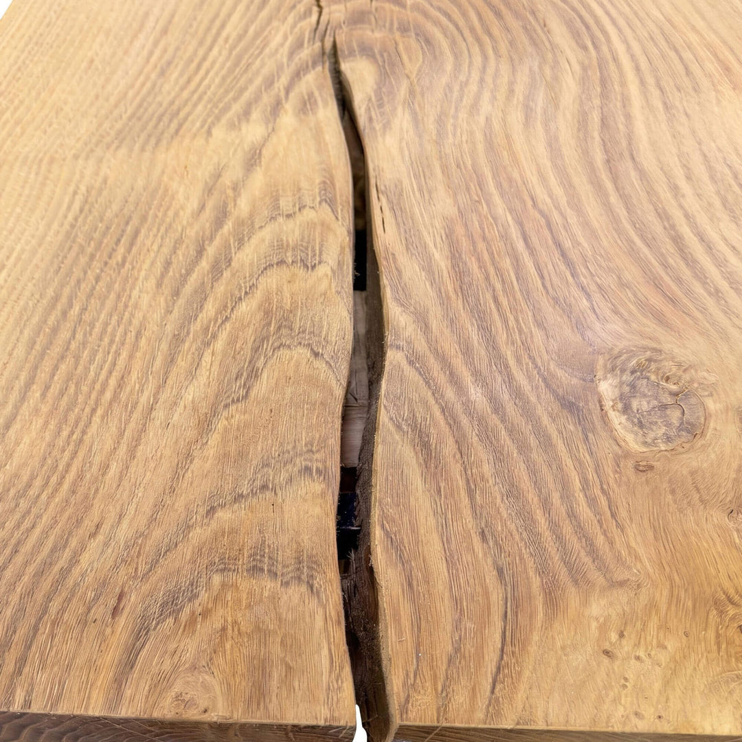 Close-up of the wood surface showing the natural grain pattern and organic variation.