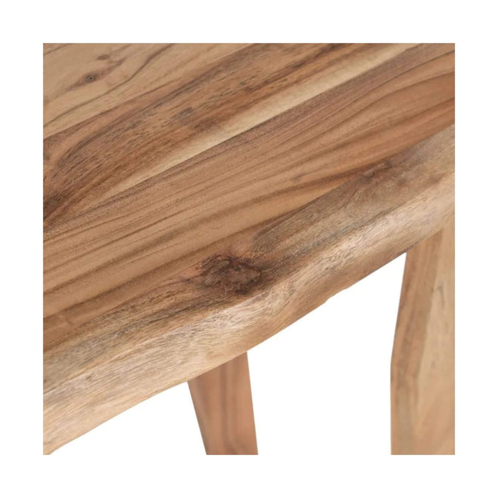 Close-up of solid acacia wood surface showcasing natural grain, knots, and warm brown tones.