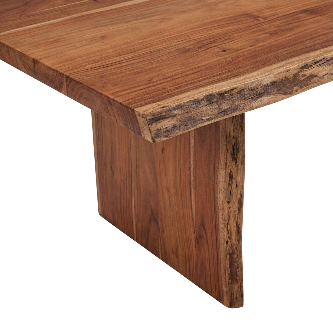 Styled dining room setting featuring the Acacia Edge dining table with warm natural decor.