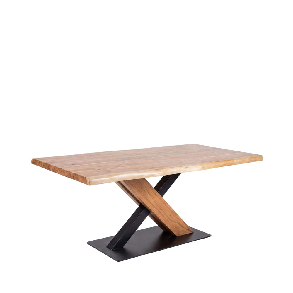 Front view of the Acacia X dining table showing its solid wood top and black iron base.