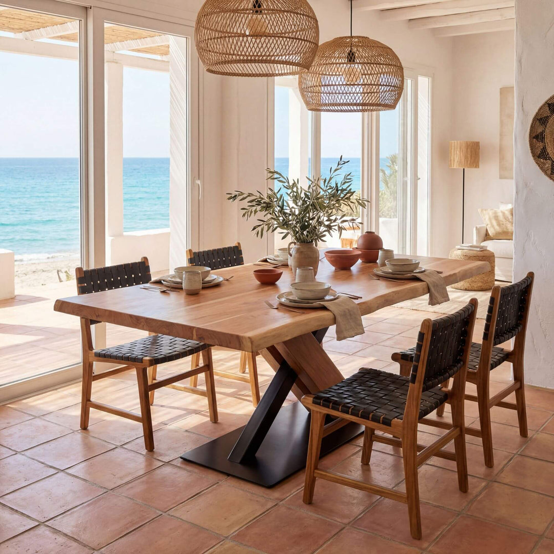 Styled dining room setting featuring the Acacia X table in a warm Mediterranean-inspired interior.