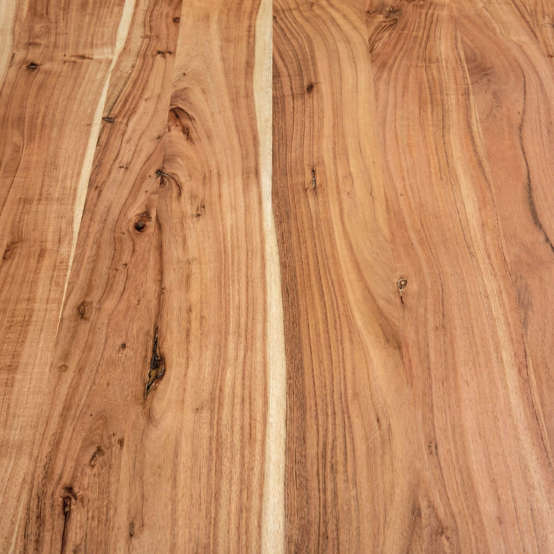 Top view of the acacia wood surface highlighting the natural grain and tone variation.