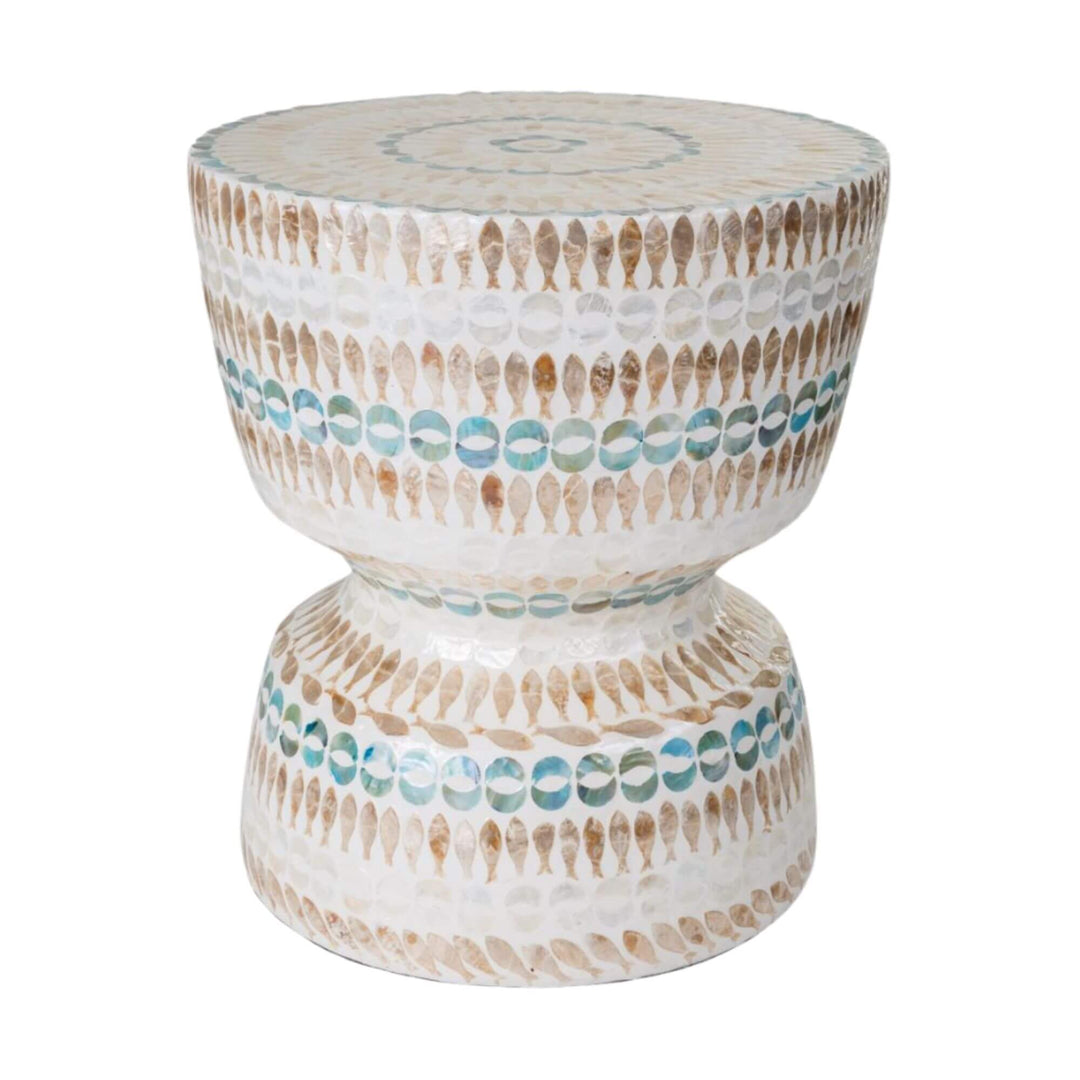 Handcrafted stool with natural capiz shell inlays in beige, white, and turquoise tones, featuring fish and circular patterns for a coastal-inspired look.