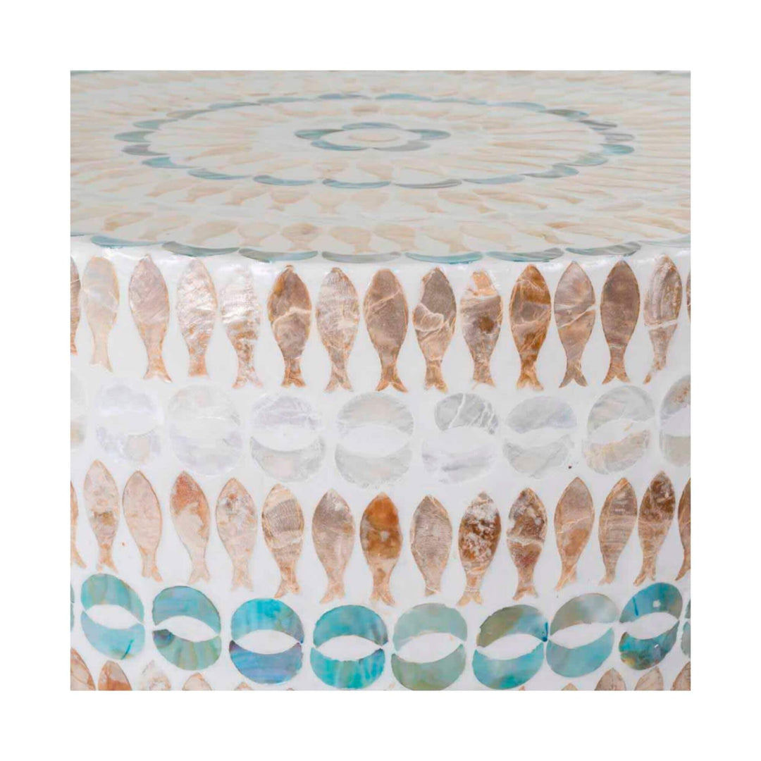 Close-up of adela´s top showing the shells in the shape of fishes. 