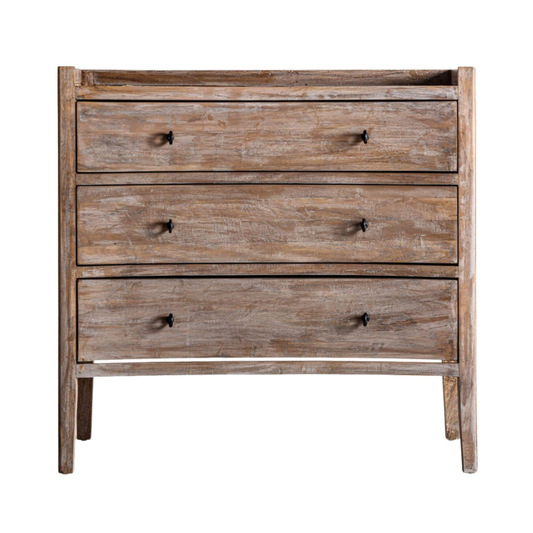 Front view of the Adrastea Dresser with three drawers and iron handles, made of rustic fir wood with a weathered finish.