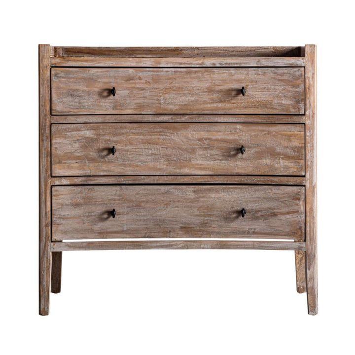 Front view of the Adrastea Dresser with three drawers and iron handles, made of rustic fir wood with a weathered finish.