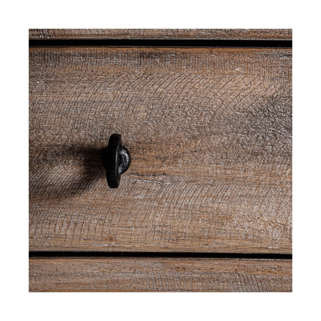 Detail of a black iron knob on the rustic fir wood drawer, highlighting the distressed grain and matte finish.