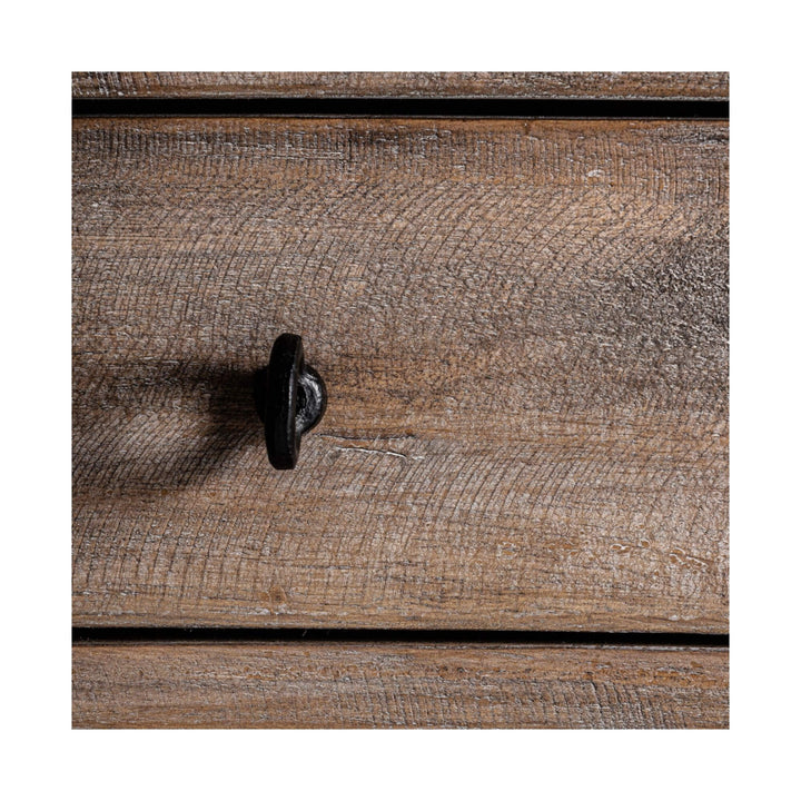 Detail of a black iron knob on the rustic fir wood drawer, highlighting the distressed grain and matte finish.