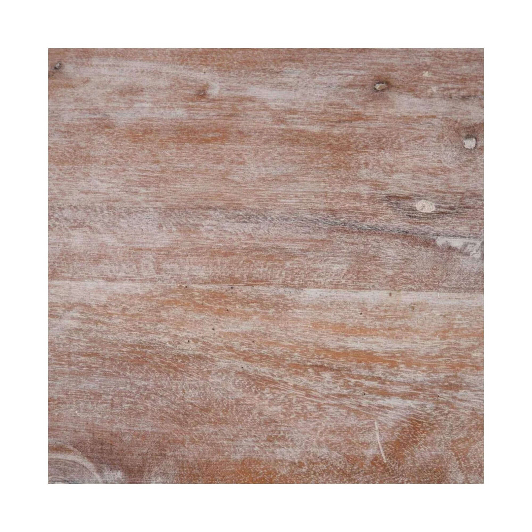 Detail of the mango wood surface with whitewashed patina and natural grain variations.