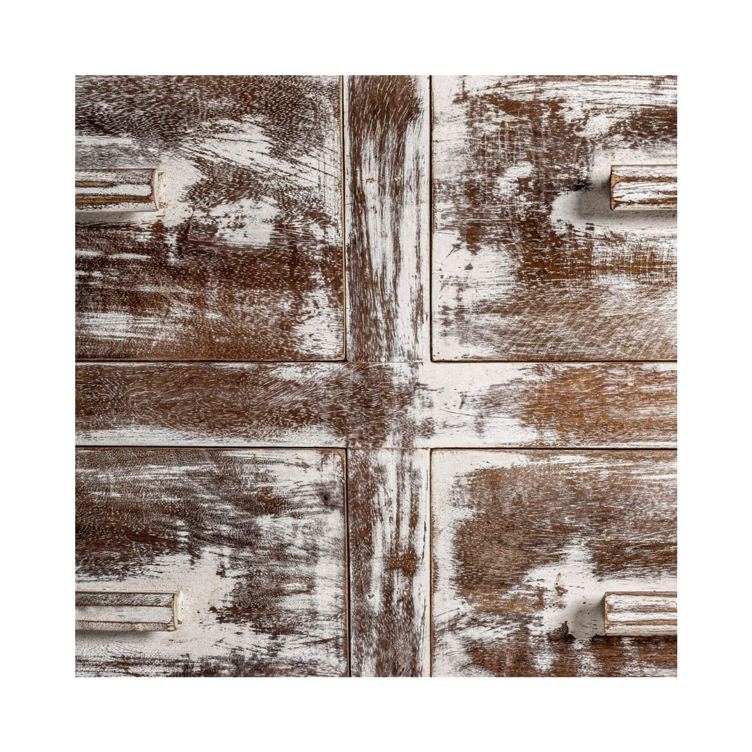 Detailed shot of the white-washed mango wood paneling on the front drawers of the wardrobe.
