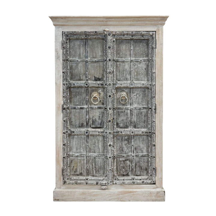 Front view of the Aeneas wardrobe crafted in distressed sheesham wood.