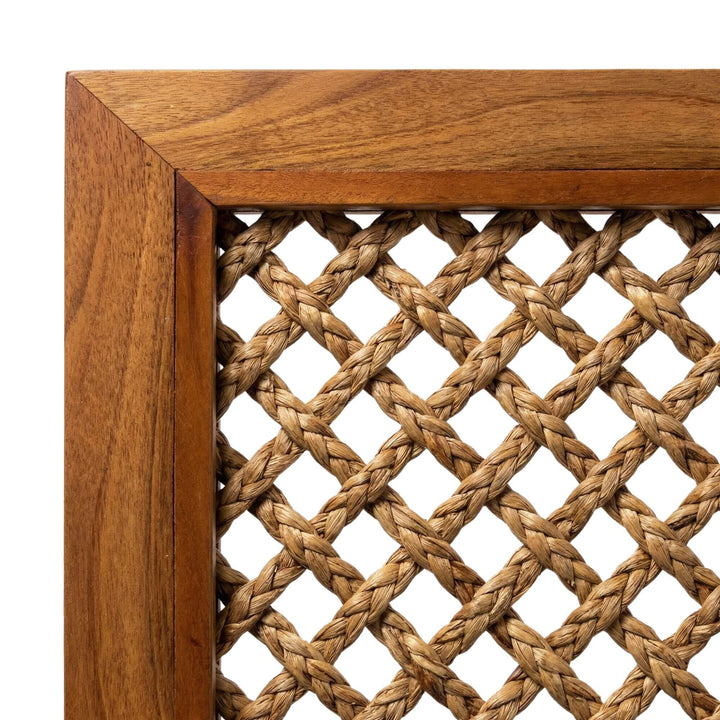 Close-up detail of the sisal weave and teak wood frame highlighting natural materials.
