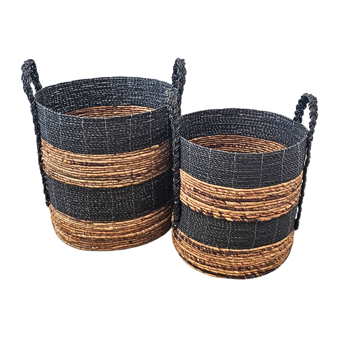 Set of two Aguadilla Banana Baskets in natural and black striped weave.