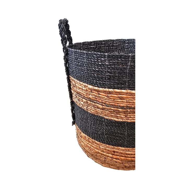 Side angle of Aguadilla Basket highlighting woven banana fiber.
