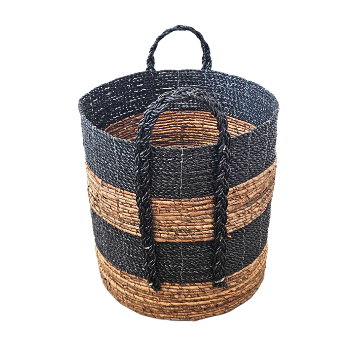 Side angle of Aguadilla Basket highlighting woven banana fiber.