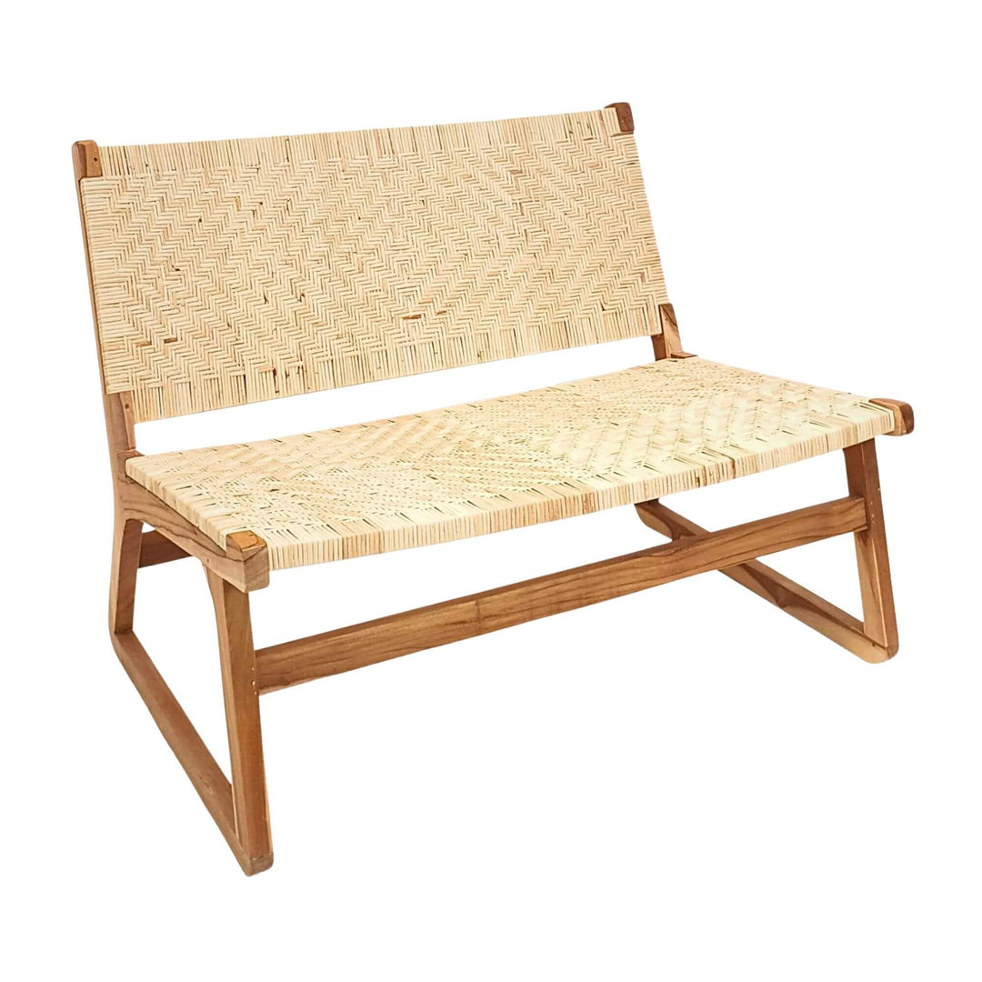 Angled view showing teak frame and woven rattan seat