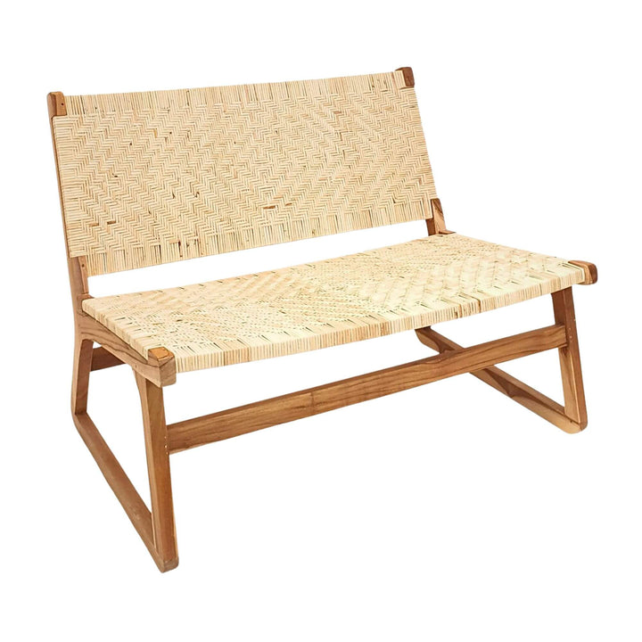 Angled view showing teak frame and woven rattan seat