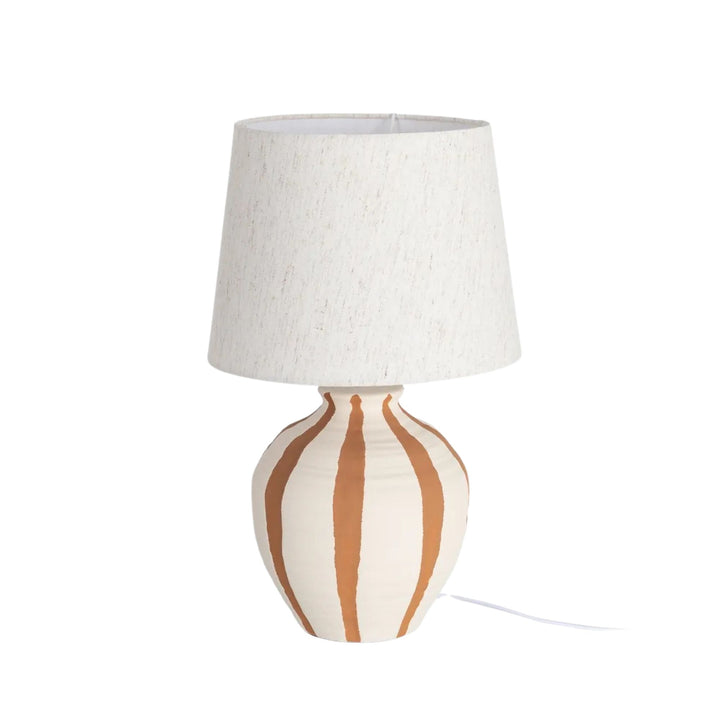 Front view of the Alba table lamp showing its ceramic base with painted terracotta lines and textile shade.