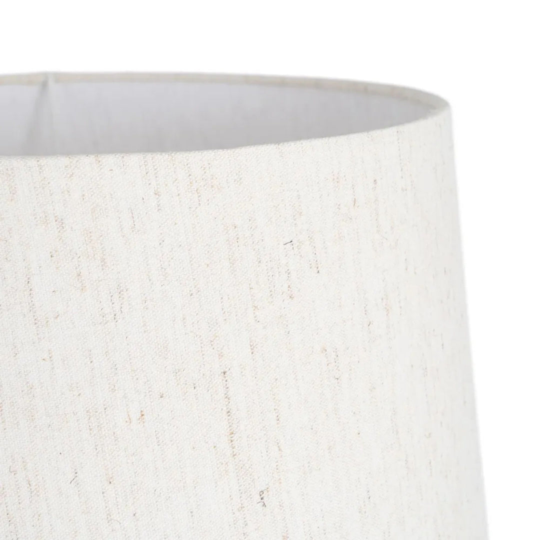Close-up of the textile shade showing its natural woven texture.