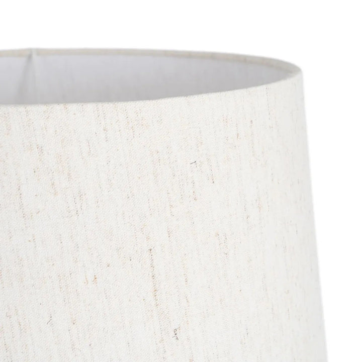 Close-up of the textile shade showing its natural woven texture.