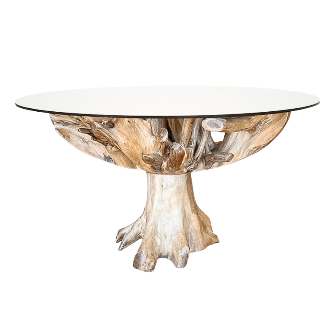 Dining table with a natural wood base and glass top on a white background