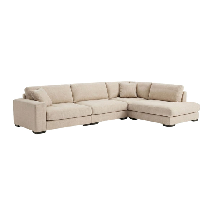 Amalfi Sofa in natural beige linen with large sectional layout.
