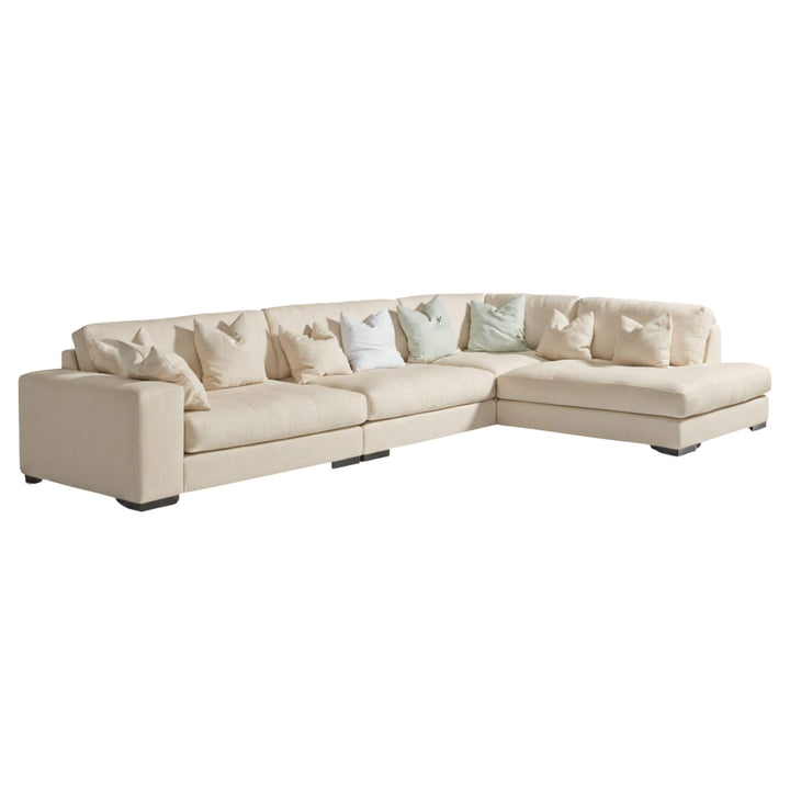 Amalfi Sofa in natural beige linen with large sectional layout.