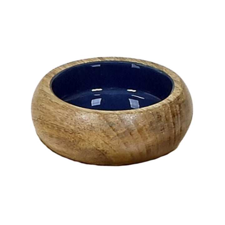 Small round mango wood bowl with glossy navy blue interior.