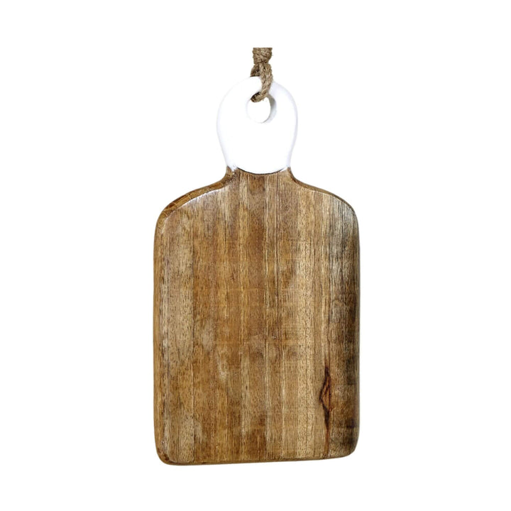 Mango wood chopping board with a white ceramic handle hanging from a jute rope.