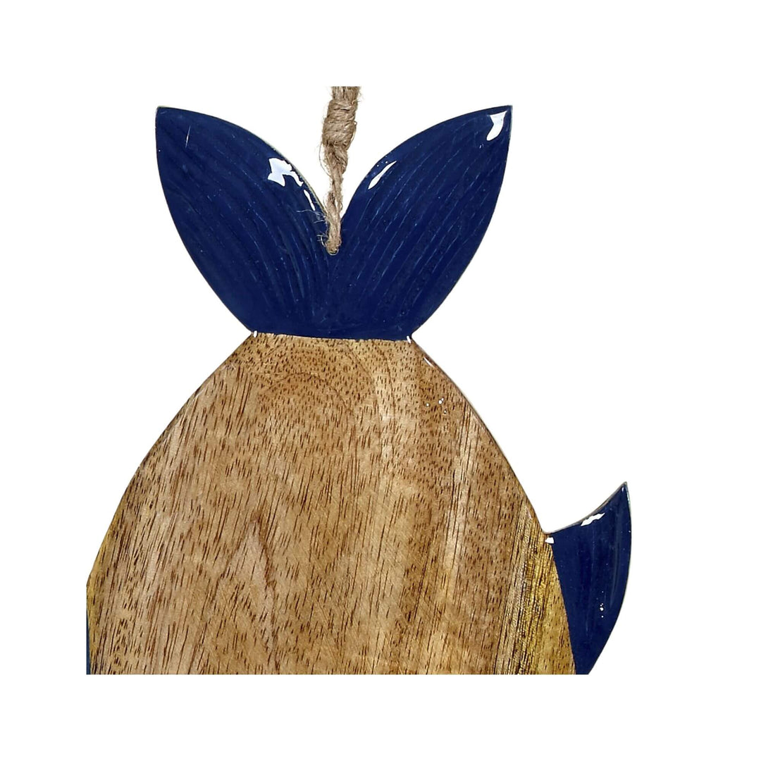 Close-up of the upper part of the Anaya Fish Chopping Board with navy-painted tail and natural wood finish.