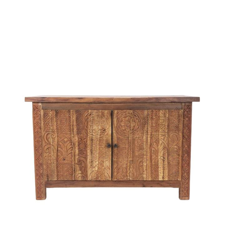 Front view of Andromeda carved teak wood buffet highlighting its intricate carved doors.