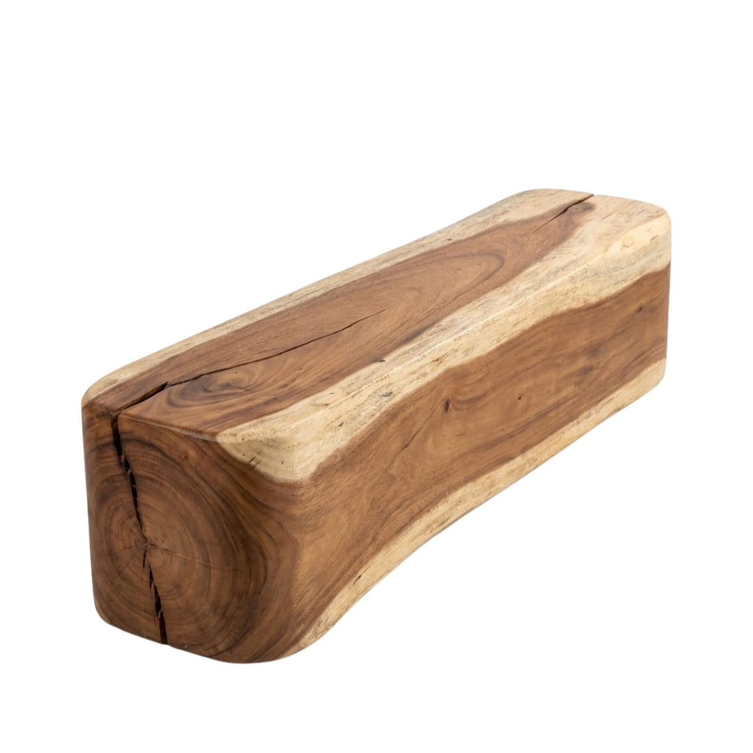 Front view of Antares suar wood bench showcasing its sculptural shape and natural wood grain.
