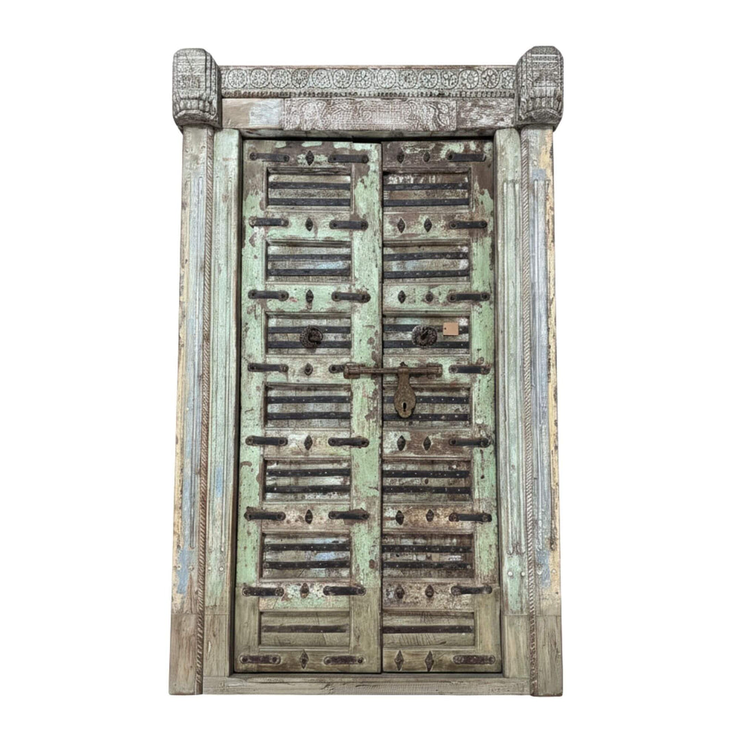 Front view of the Antique Indian Door showing detailed carvings and weathered sheesham wood.