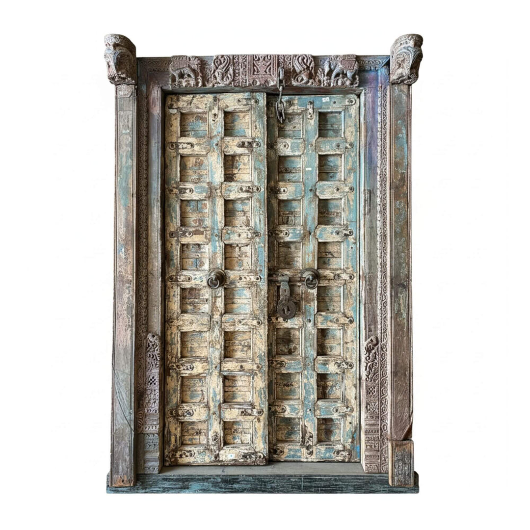 Front view of the antique Indian door crafted from solid sheesham wood with carved panels.