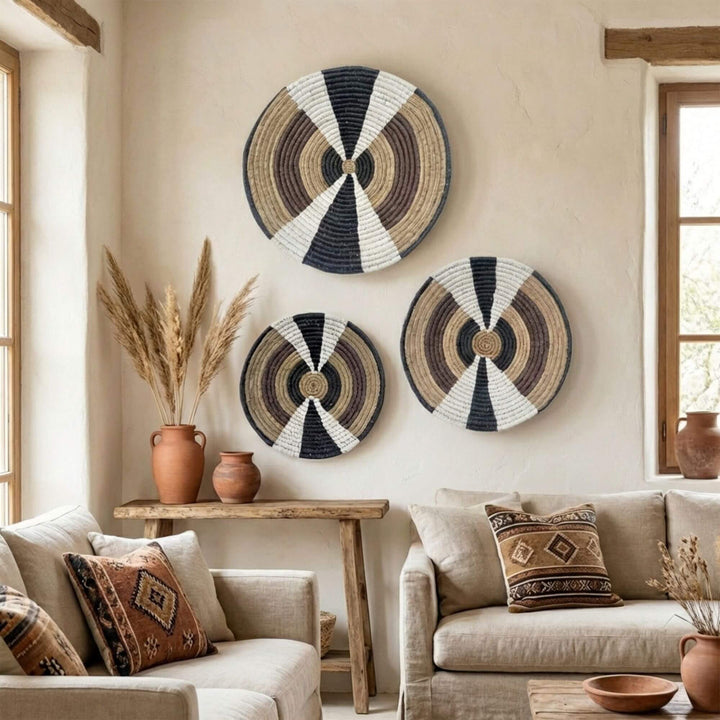 Decorative Aonang wall deco plate on a beige wall in a living room with neutral tones.