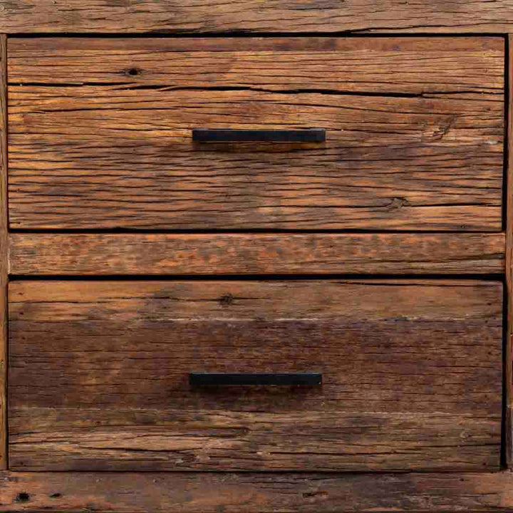 Close-up detail of the Arava TV Console drawers and wood grain texture.