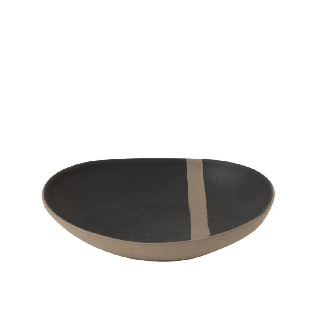 Arcai ceramic soup bowl with matte black finish and natural accent line on white background.