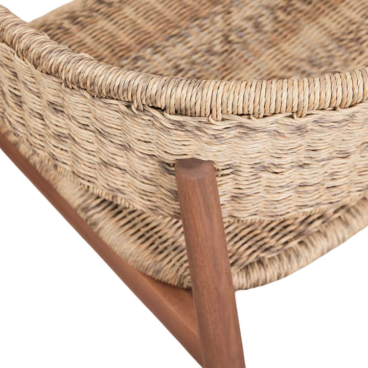 Close-up detail of the woven seat and backrest with natural texture.