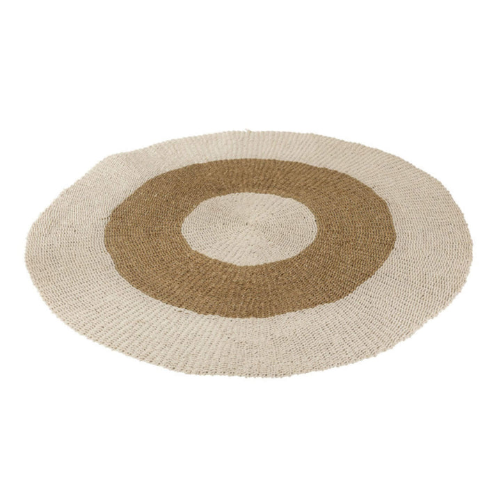 Circular Arena Rug made of natural woven fibers in neutral tones.

