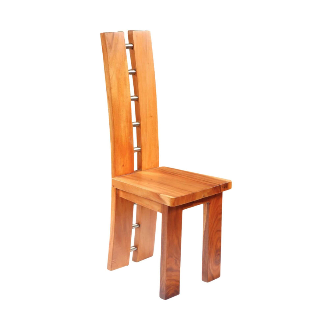 Argus dining chair made of solid suar wood with sculptural backrest and metal accents.

