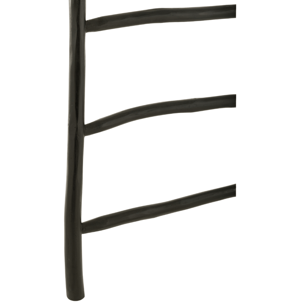 Close-up of handcrafted teak wood texture in the Aride black ladder. 