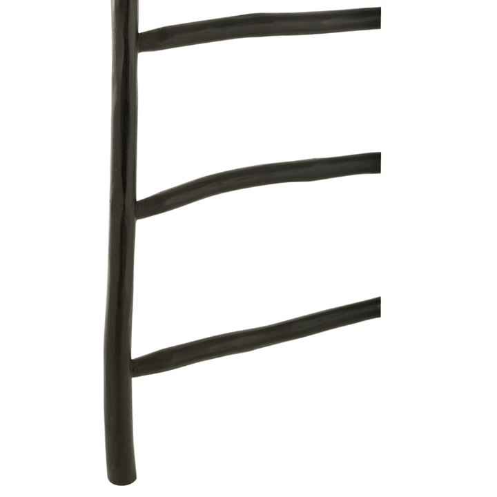 Close-up of handcrafted teak wood texture in the Aride black ladder. 