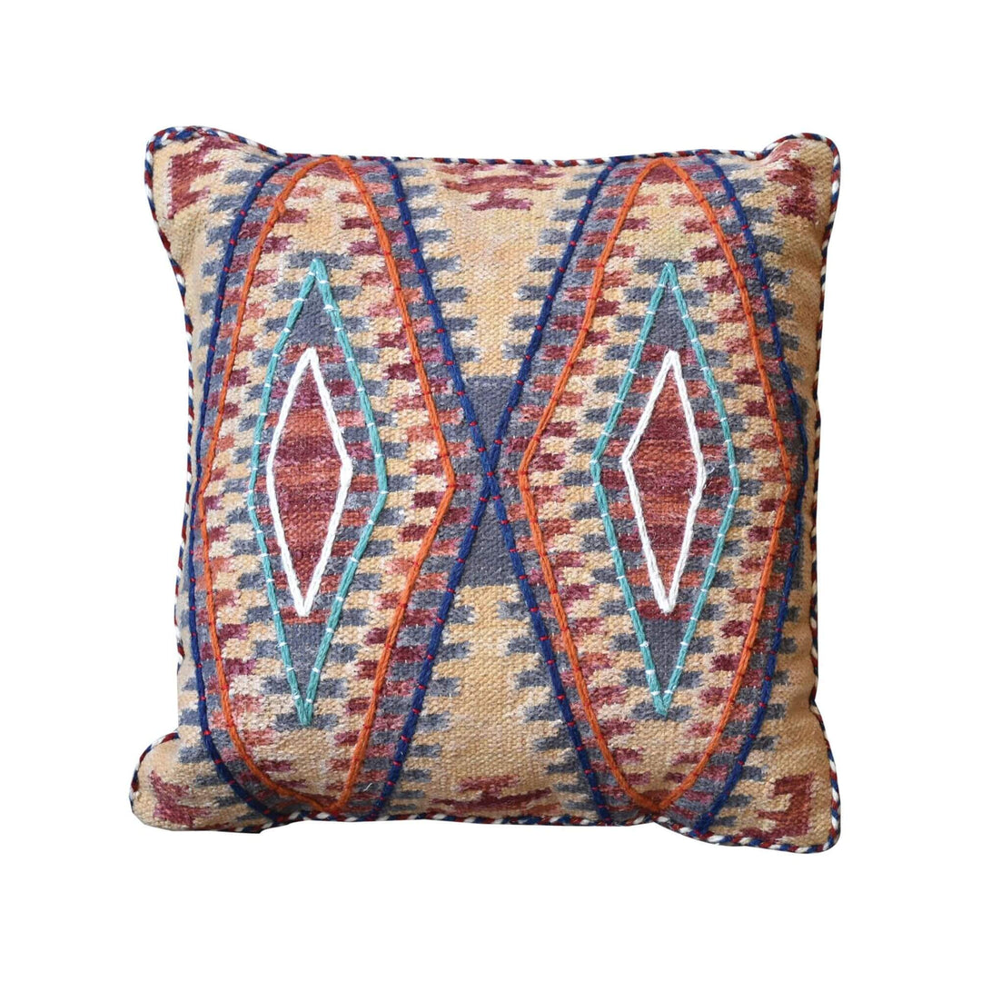 Front view of the Arjuna Cushion showing its multicolor geometric wool and cotton design.